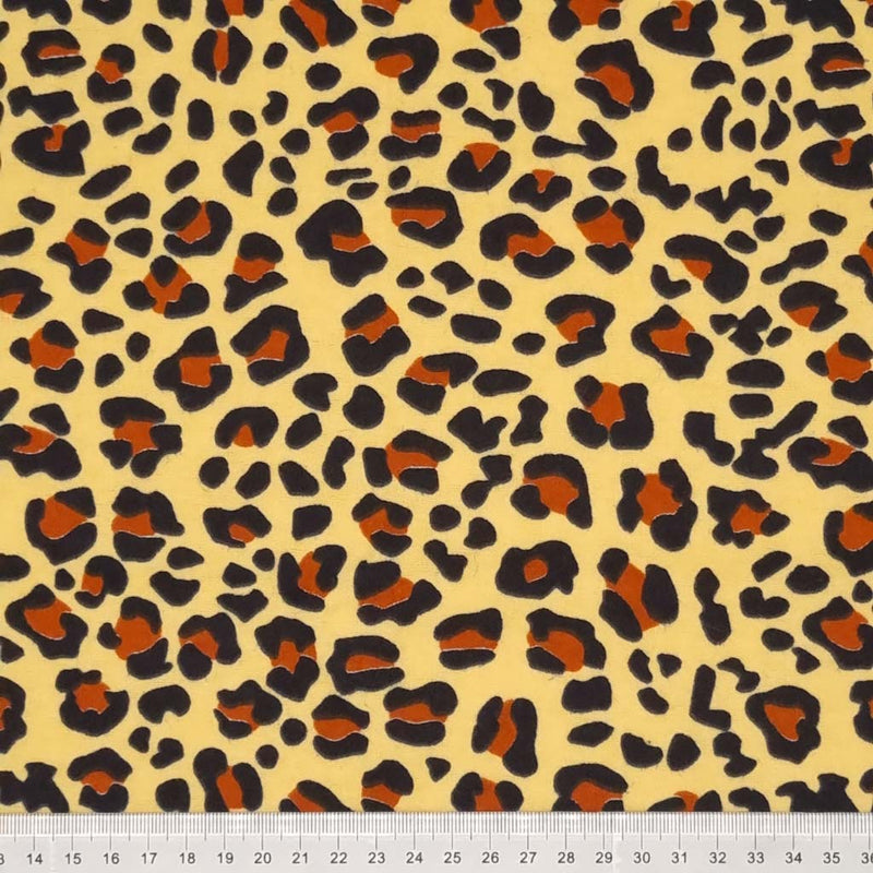 A natural leopard print design, on a cream soft brushed polycotton winceyette. with a cm ruler