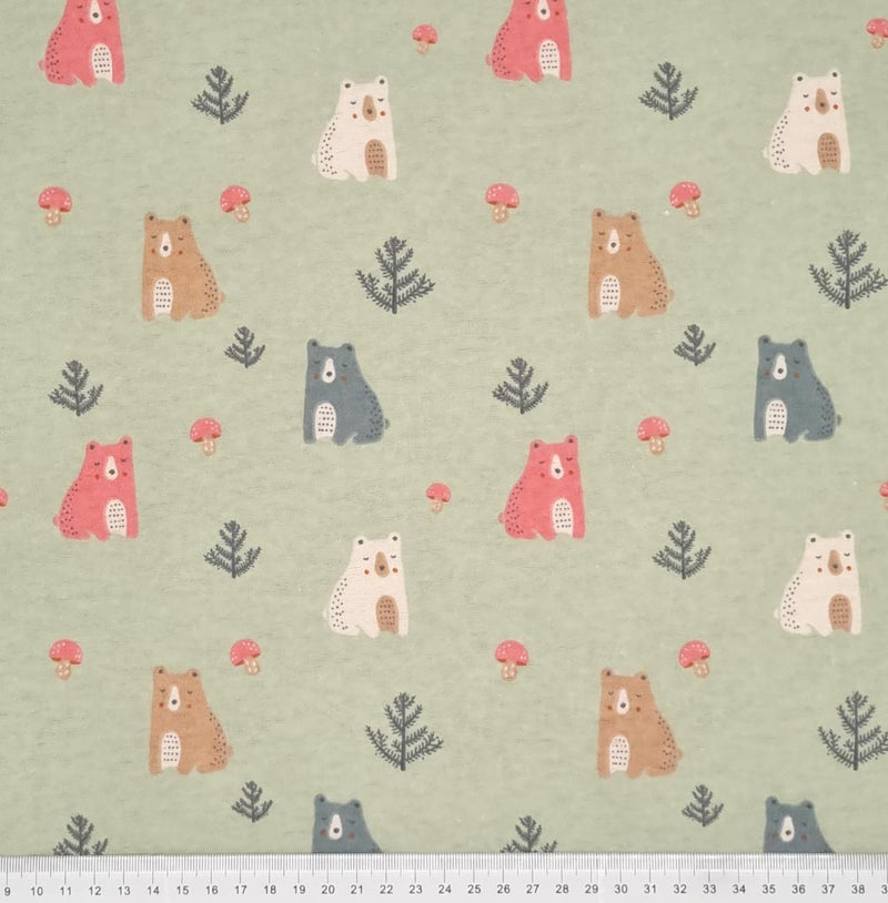 A cute forest bear design, printed on a soft brushed polycotton winceyette in light sage green with a cm ruler at the bottom