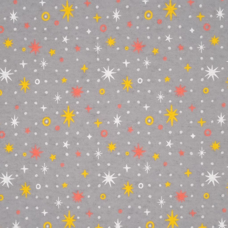 Sparkle stars in yellow and white printed on a grey, soft brushed polycotton winceyette.